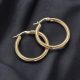 Nemesacél vastag falú arany színű karikafülbevaló